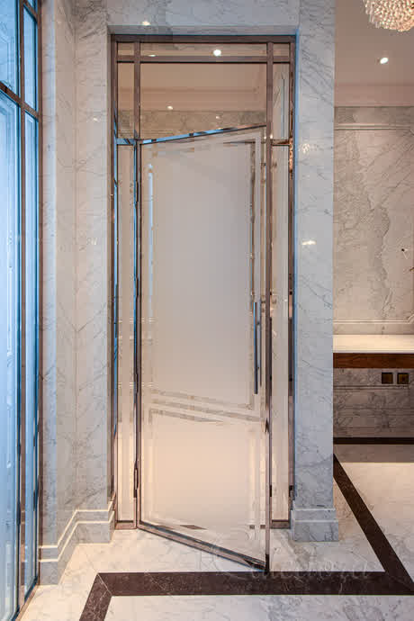 shower enclosure with polished nicle frame and partially frosted glass