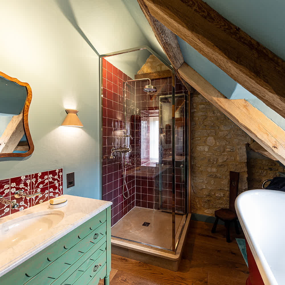 bifold shower enclosure with a nickel frame