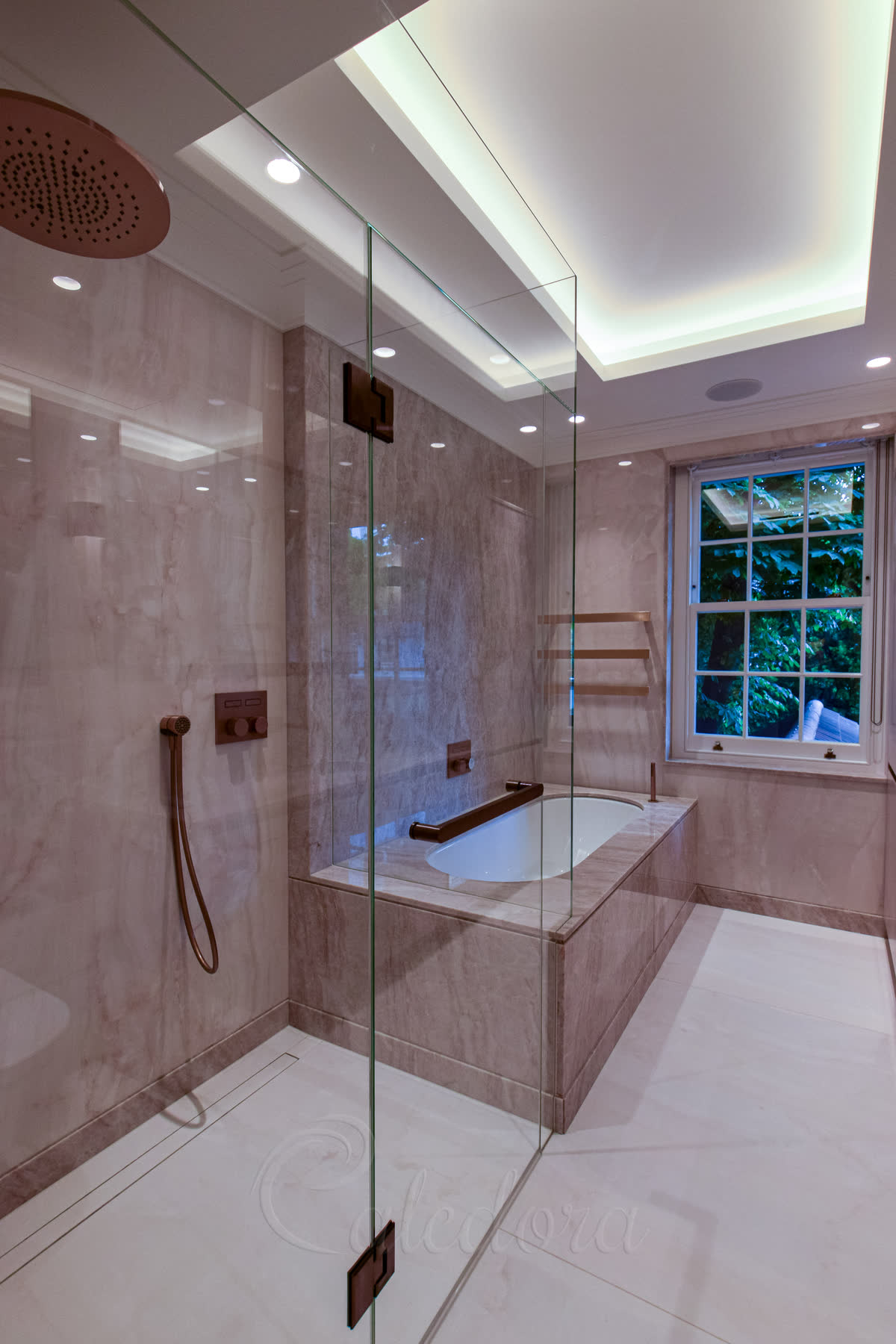 Luxury glass shower enclosure with frameless full-height panels in a London bathroom