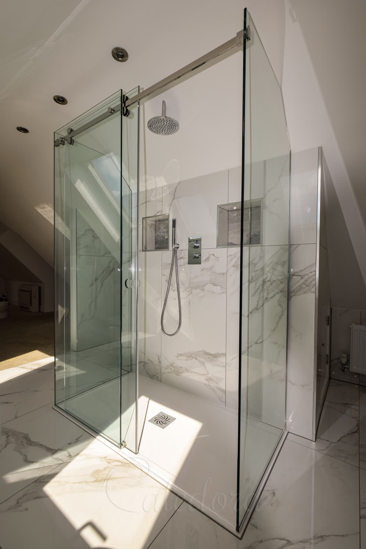 3-sided shower enclosure with sliding door open showing clear threshold