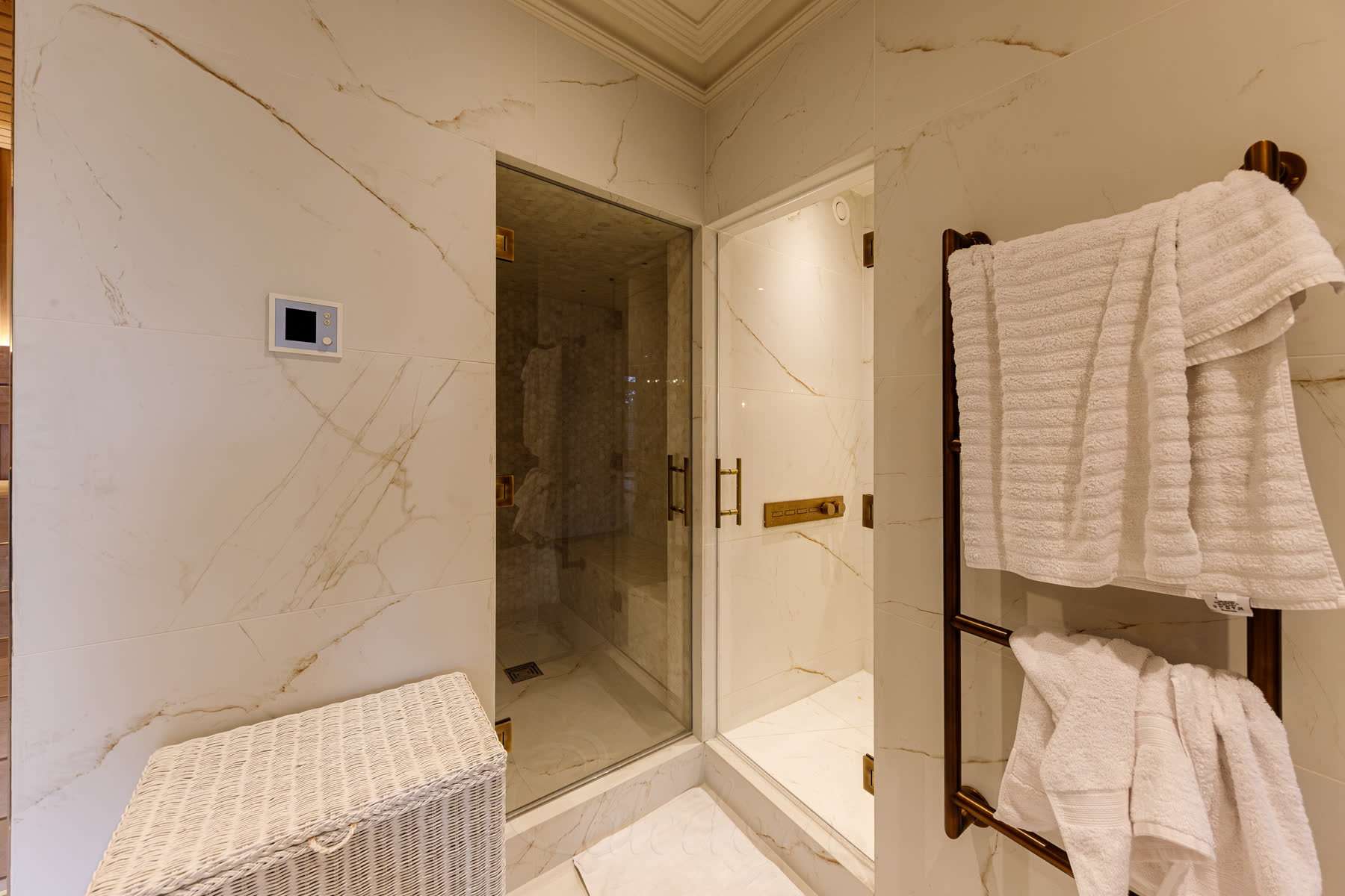 Two matching doors with a heated towel rail close by for everyday use