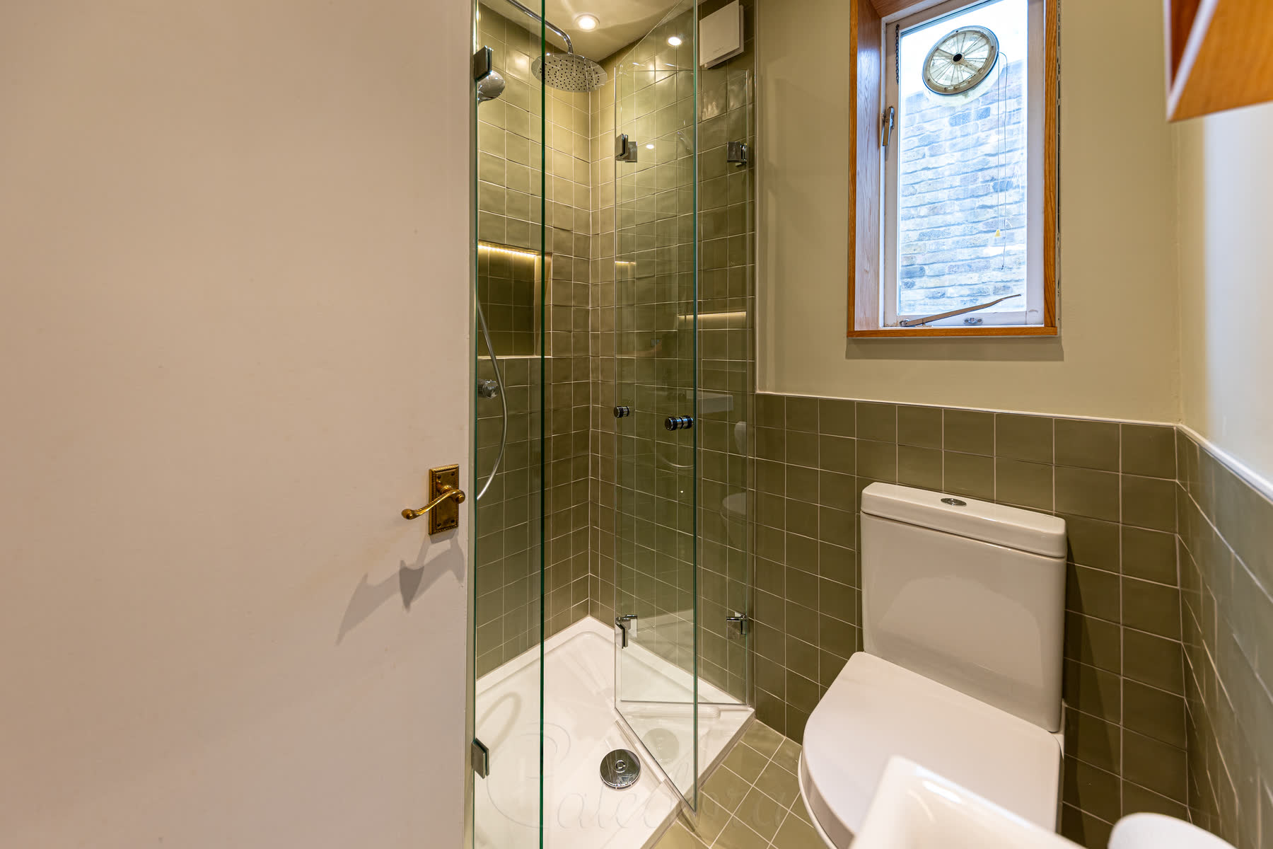 Polished chrome bifold door handles designed for easy opening with both hands