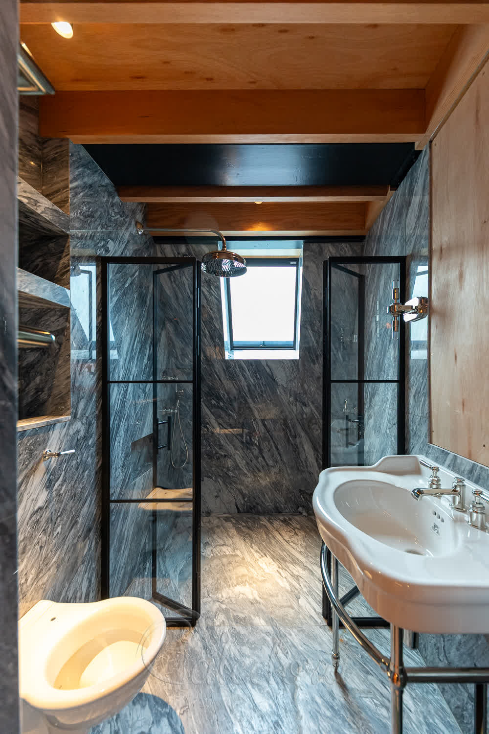 Both double doors fully opened inside shower with magnetic door stays