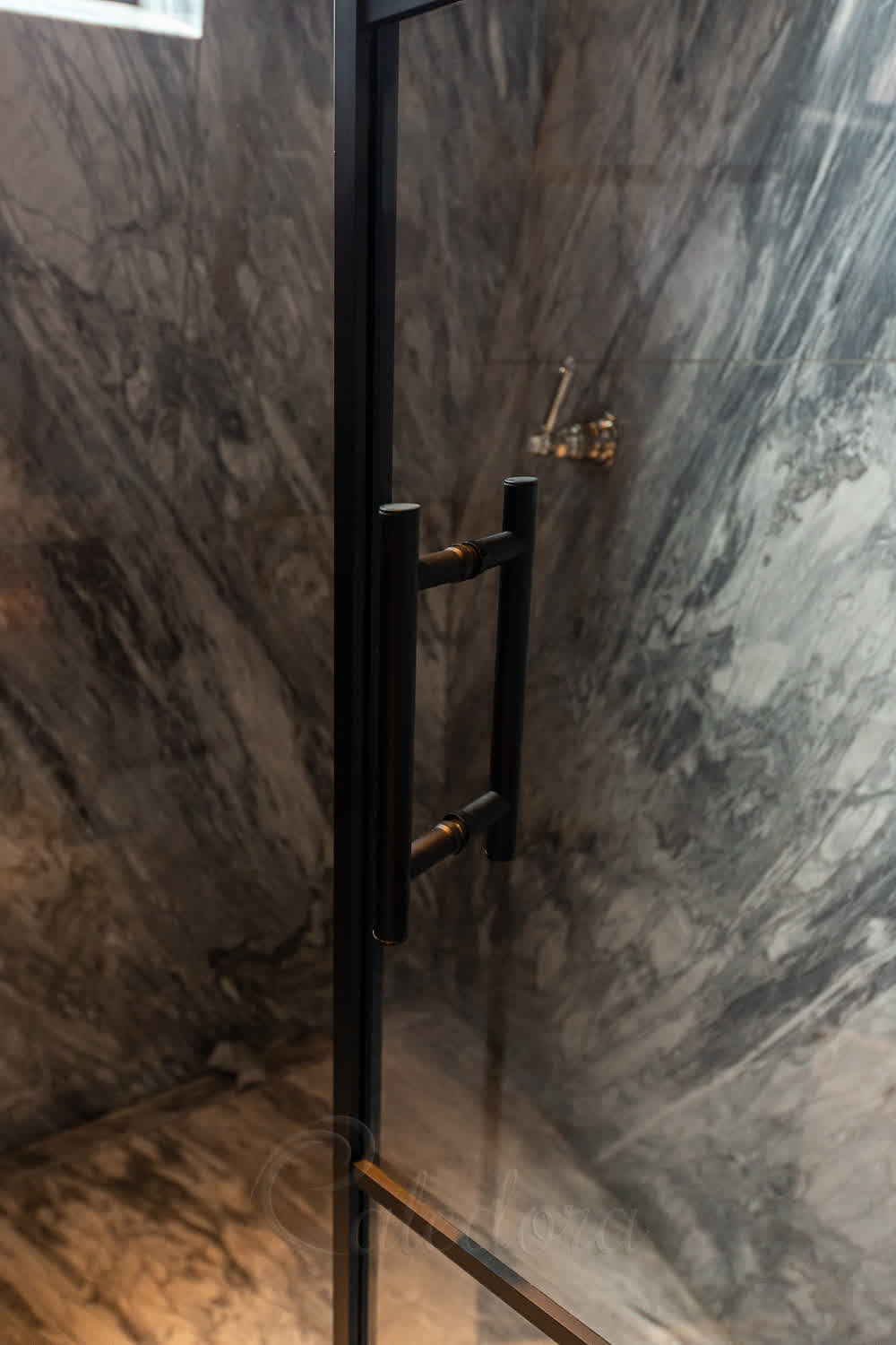 Close-up of black ladder handle and frame detail with grid pattern