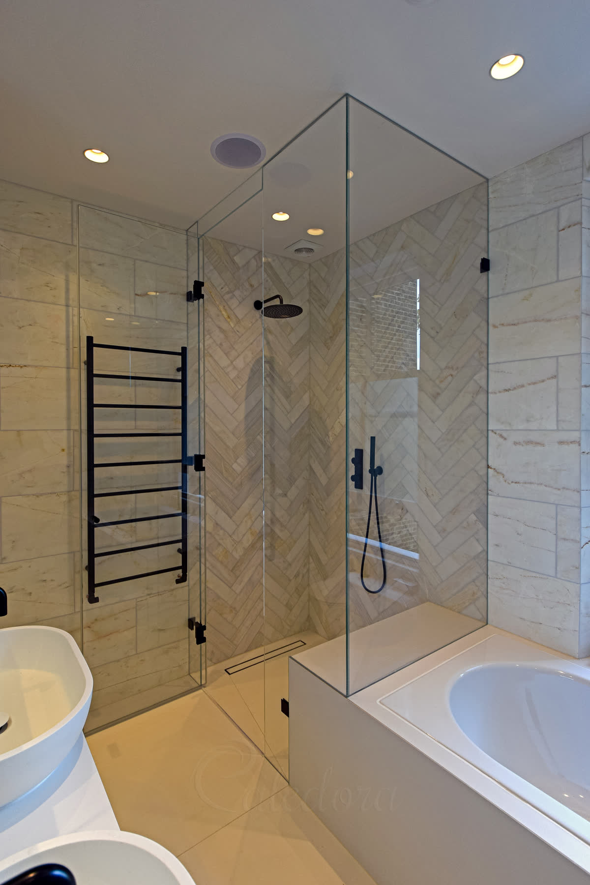 Black over bath shower face view with door open revealing full height installation