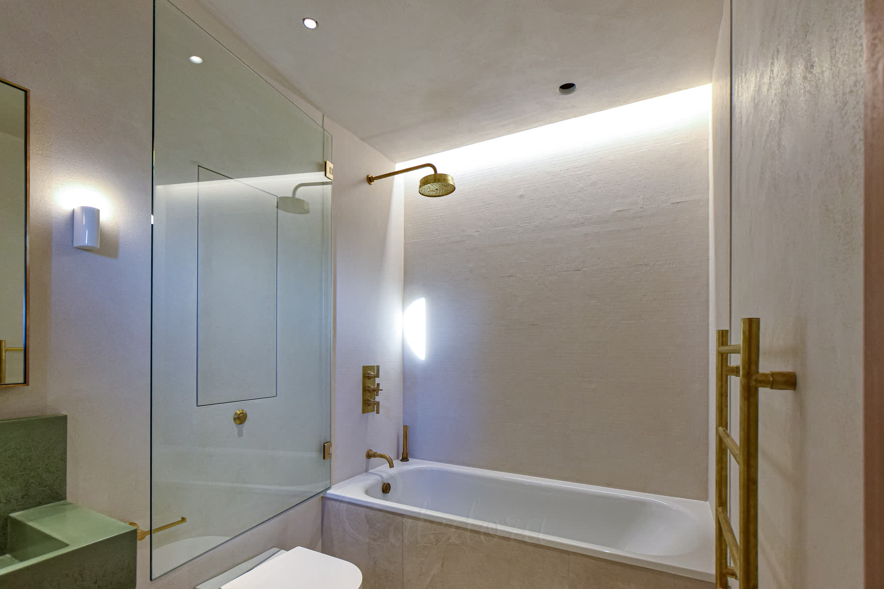 second bathroom with brushed brass bath screen opened