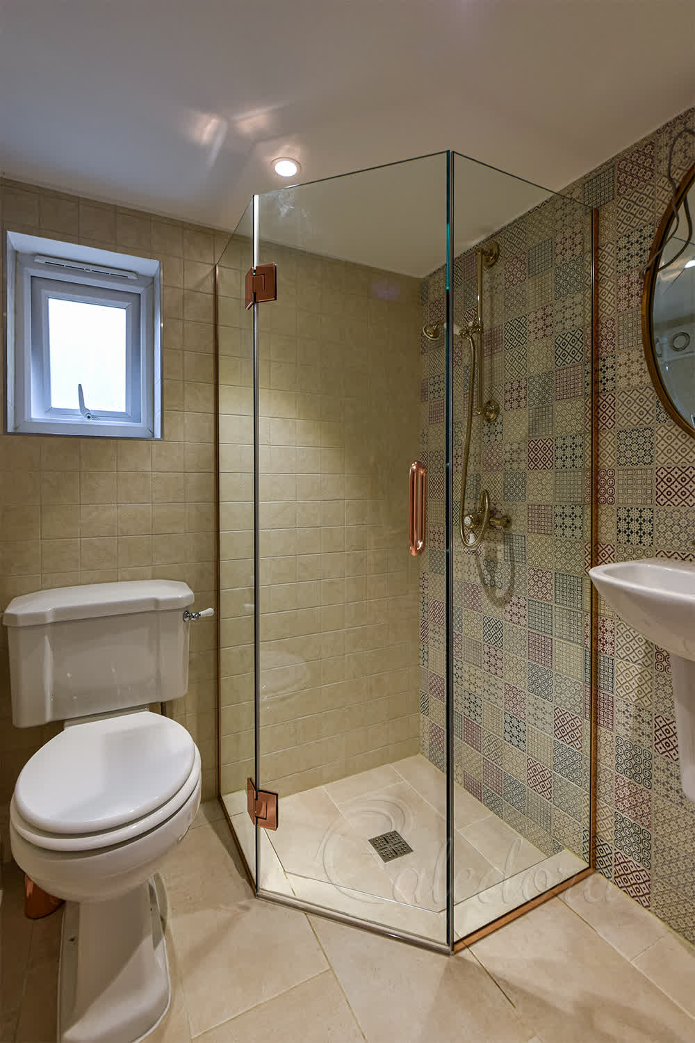 Diamond pentagon shower enclosure with polished copper hinges in compact London bathroom