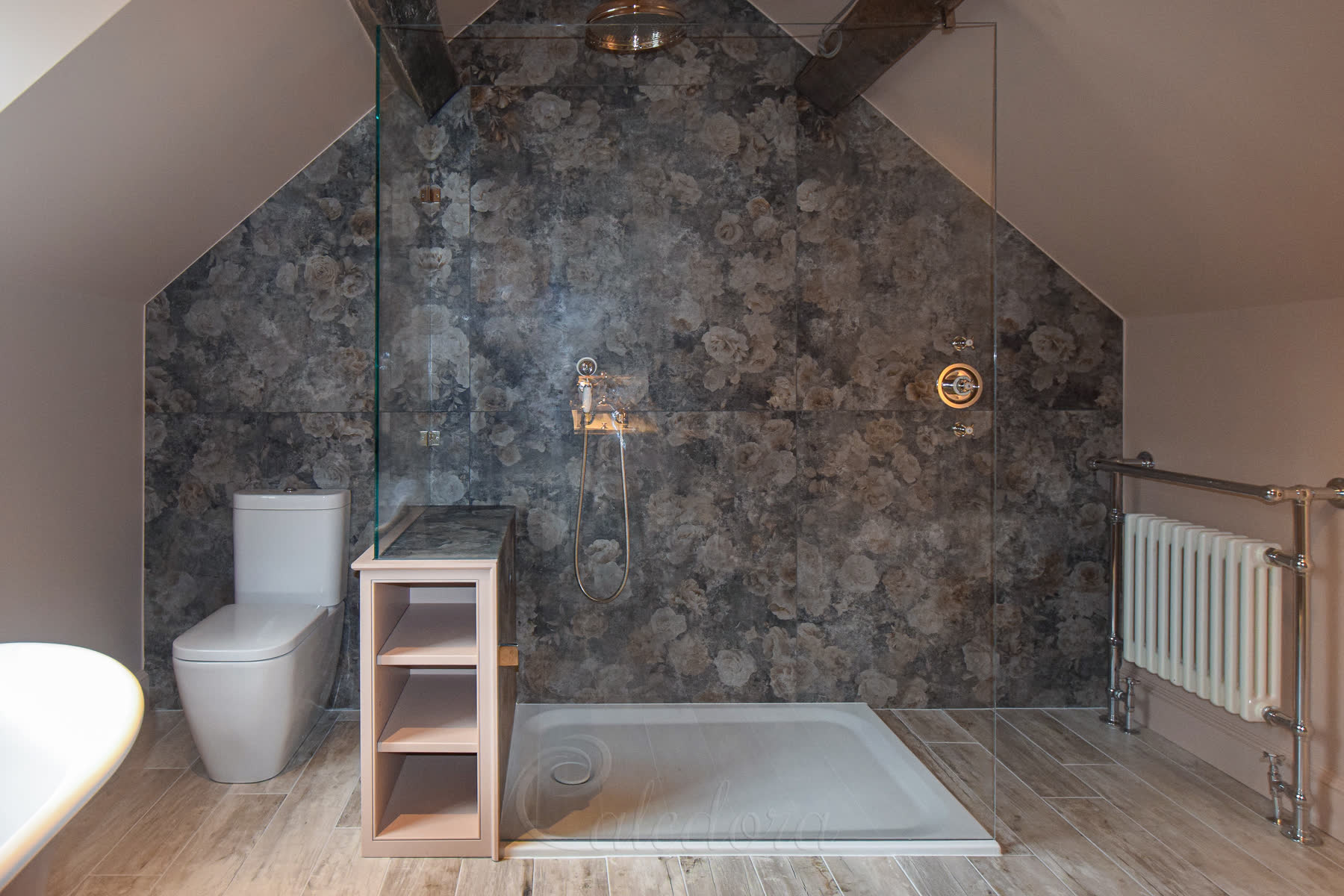 Full view of the frameless shower screen with polished nickel wall brackets