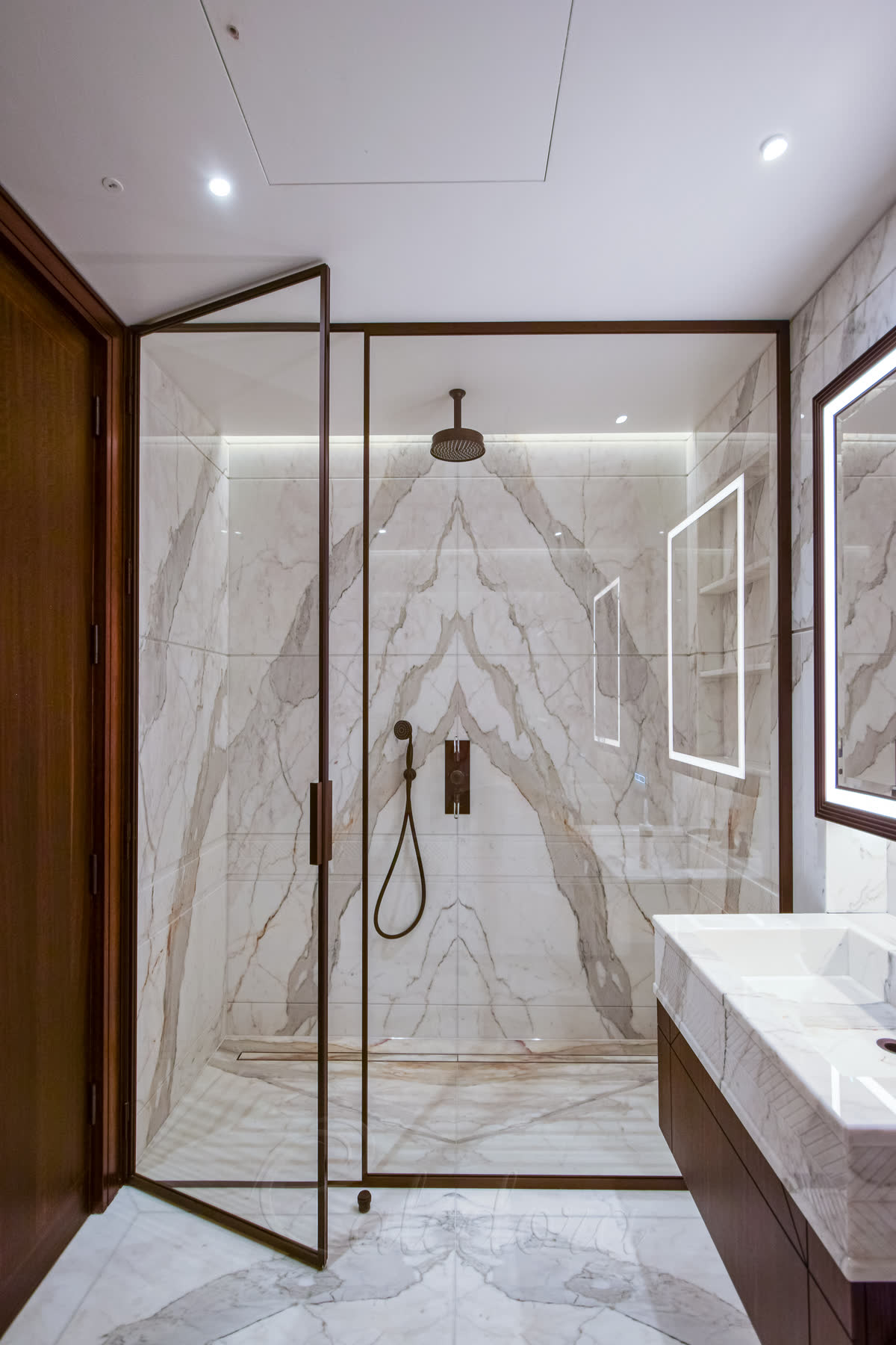 Detailed view of bronze shower frame with premium finish in London property