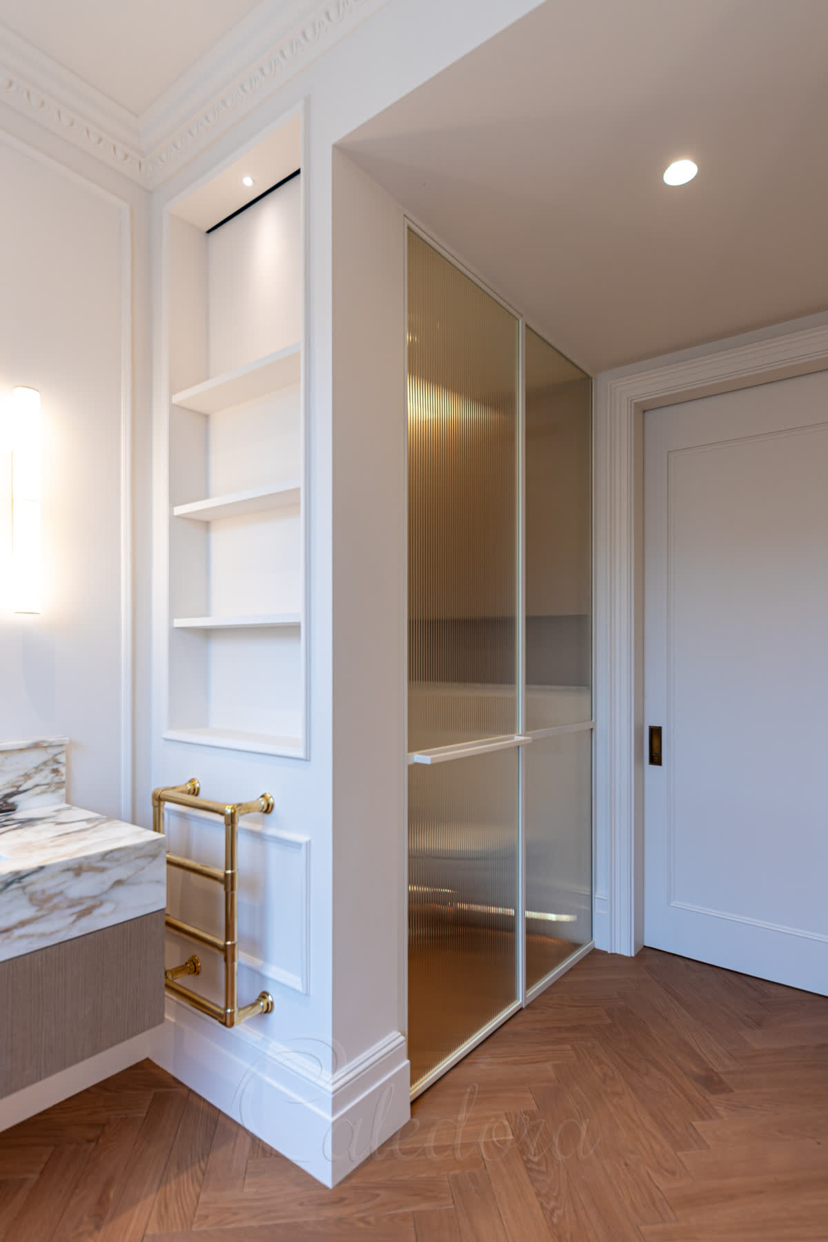 White shower door with inline screen featuring fluted glass and white powder coated frame