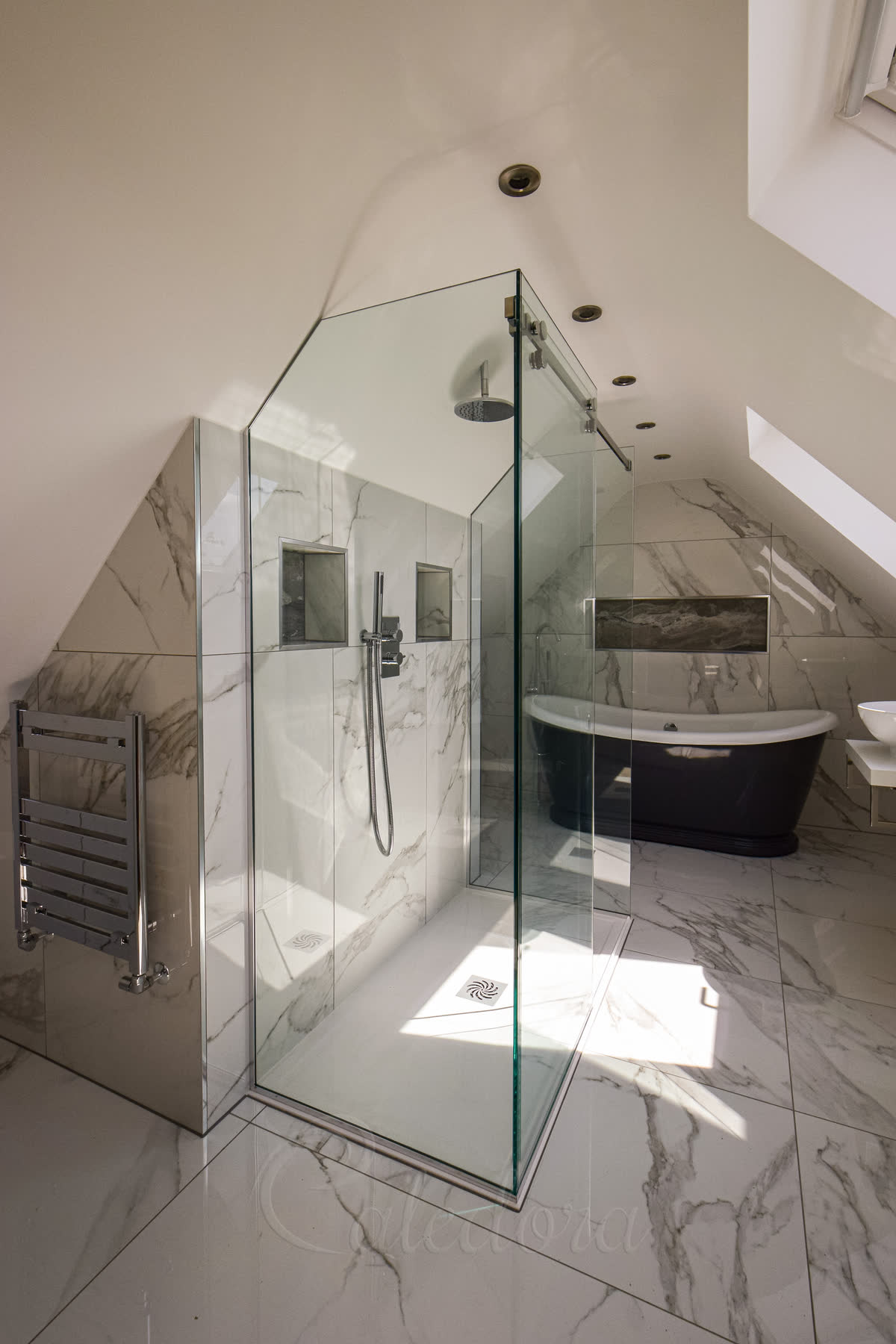 Side view of a frameless sliding shower enclosure with 10 mm clear glass — the natural green tint of standard clear glass visible along the polished edge, set against chrome rollers on a tube above and chrome U-channels along the wall