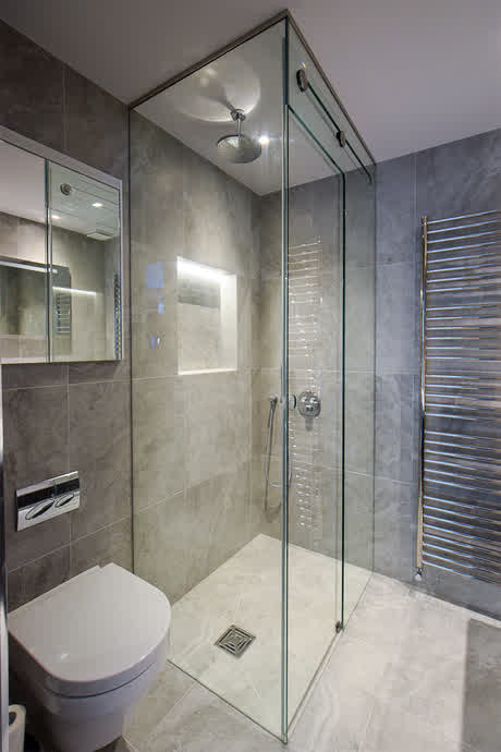 full height sliding shower enclosure to the ceiling